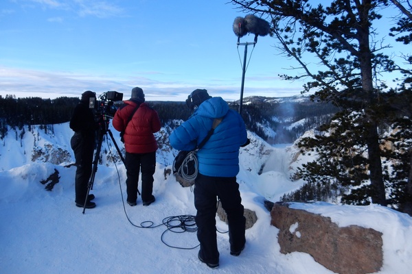 A video crew films the Lower Falls